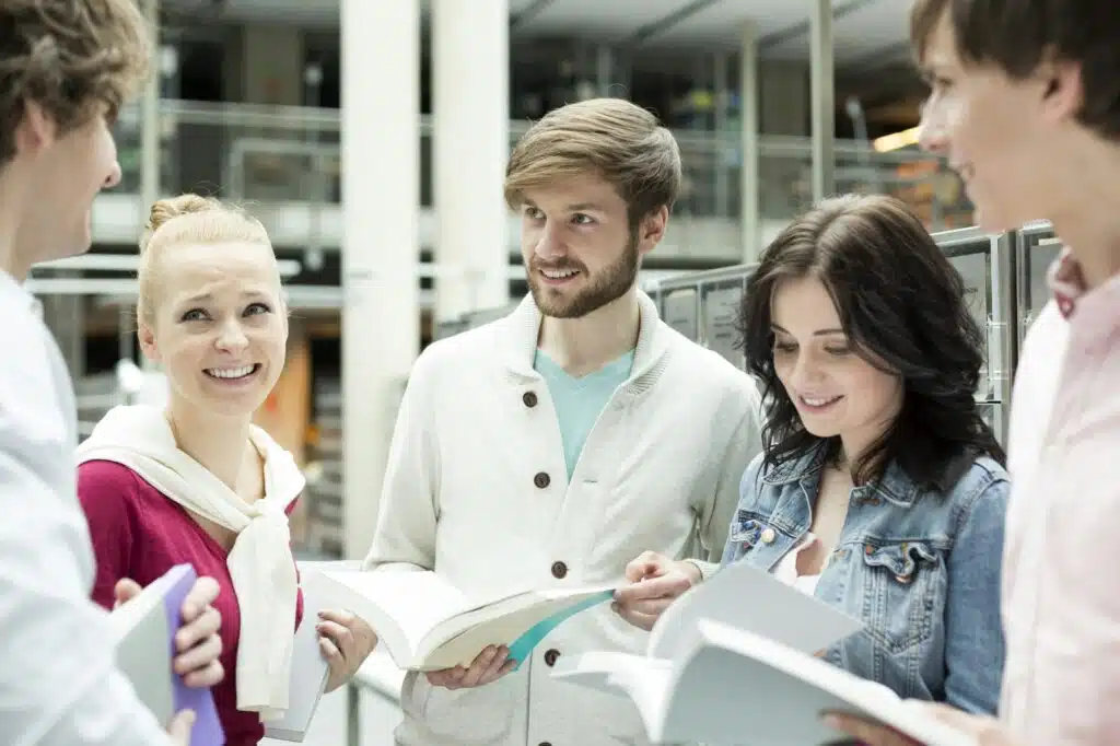 Group of students learning in a university library